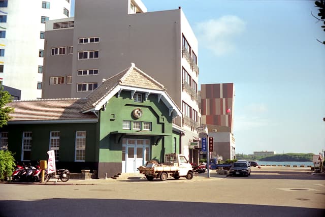 Charming historical green building in Magong City, Penghu County, Taiwan bathed in summer sunlight.