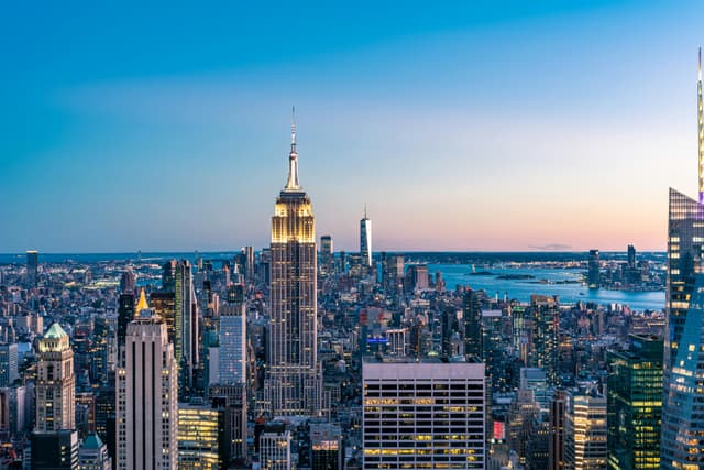 Stunning New York City skyline view during twilight, featuring iconic skyscrapers like the Empire State Building.