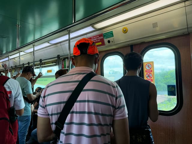 Commuters and passengers inside the LRT train